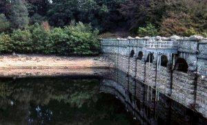 Burrator Dam, Devon, during the during the drought of summer 1976 (low water level)